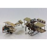 Two tin plate models of tri-planes