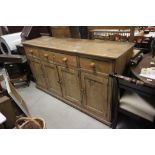 Large 19th century Pine Dresser Base comprising Long Drawer flanked by Two Short Drawers over Four