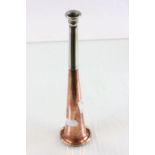 A vintage copper and nickel hunting horn.