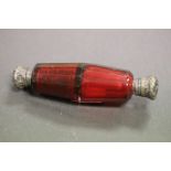 Double ended Cranberry glass scent bottle with white metal tops