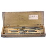 Vintage wooden cased "Footprint" tap & die set