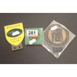 Two vintage car badges to include Southern Land Rover Owners Club and an Austin 50 Years token