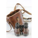 Vintage pair of leather cased Binoculars by Dollond