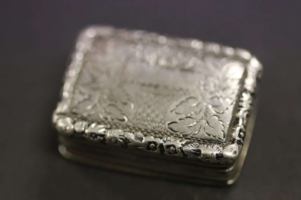 An early 19th century silver vinaigrette .