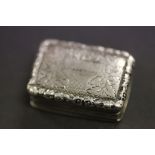 An early 19th century silver vinaigrette .