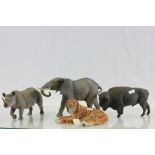 Four Wade World of Survival Animal figures to include; Tiger, Buffalo, Elephant, Rhino