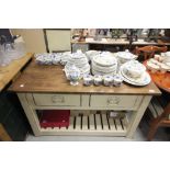 Substantial painted farmhouse kitchen work island with two drawers to eitherside