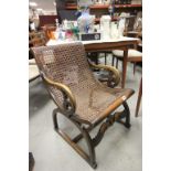 Early 20th century Walnut Bergere Chair with Carved Scroll Arms and D Shaped Supports