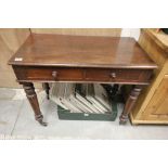 19th century Mahogany Side Table with Two Drawers raised on turned legs and castors