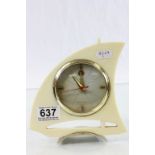 A mid 20th century retro clock in the form of a yacht.