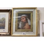 An ornate framed oil painting portrait of a bearded man in Keffiyeh headdress