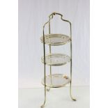 Brass three tier cake stand with plates