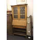 Arts and Crafts Oak Bureau / Bookcase, the upper section with leaded glazed doors with stylised