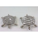 Two white metal trivet in the form of tortoises