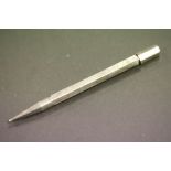 A silver propelling pencil.