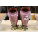 A pair of Lemon and Crute Torquay pottery vases with floral decoration.