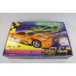 Boxed Scalextric Powerslide containing Nissan 350Z Orange Car and Nissan 350Z Green Car