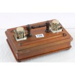 Mahogany ink stand with a pair of brass topped glass inkwells