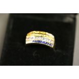 A 14ct yellow gold Chanel set sapphire, tanzanite, citrine and diamond ring 1.4cts approx