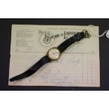 Hallmarked 9ct Gold cushion cased Rotary gents wristwatch with original sales receipt