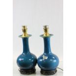 Pair of Chinese Turquoise Blue Ceramic Table Lamps on Carved Wooden Bases
