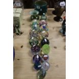 Large quantity of glass paper weights to include Caithness, Gleneagles etc and three art glass