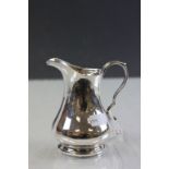 A Silver Georgian style jug maker Barker Brothers Ltd Birmingham 1961.