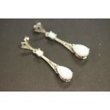 A pair of silver marcasite and opal drop earrings