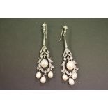 A pair of 9ct gold Art Deco style earrings with freshwater pearl drops