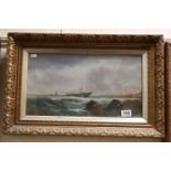 Oil Painting under Glass of Sailing Ship near the shore in ornate gilt frame