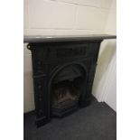 19th century Cast Iron Fireplace with relief pattern of Classical Urns and Swags
