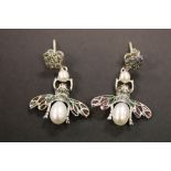 A pair of silver and enamel set bee earrings with pearl drops