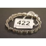 A 14ct white gold diamond line bracelet of 136 stones 1.5 cts approx