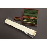 Cased vintage technical drawing set, a cased slide rule & a cheroot case with another drawing tool