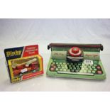 A tinplate Mettoy 'Supertype' typewriter, along with a Dinky 'Convoy' fire rescue truck No.384 in