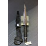 Fairbairn Sykes commando dagger by Sheffield maker stamped 1971 with broad arrow and sheath
