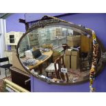 1930's Oval Copper Framed Bevelled Edge Mirror with embossed floral detail