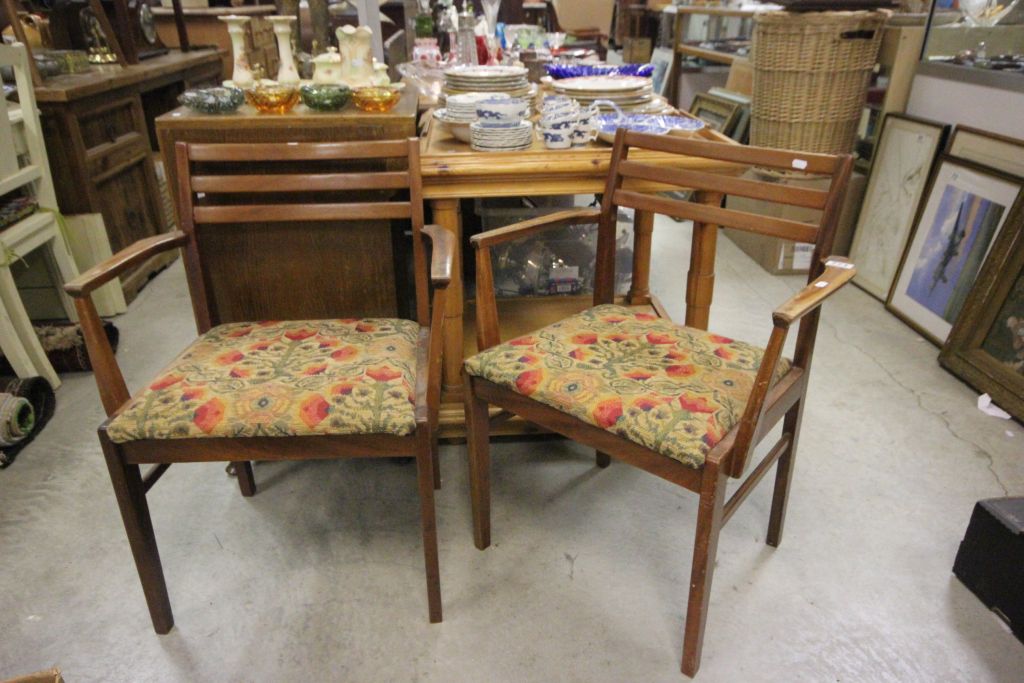 Pair of 1970's mahogany armchairs with label to reverse (Hunts of Oxford)