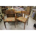 Pair of 1970's mahogany armchairs with label to reverse (Hunts of Oxford)