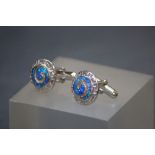 A pair of silver and enamel Tiffany style cufflinks