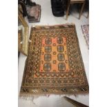 Small Brown and Red Eastern Wool Rug