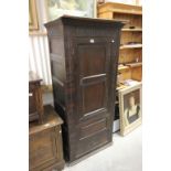 Jacobean Style Oak Panelled Cupboard, the single hinged door opening to reveal a modified interior