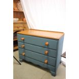 A blue painted oak chest of three long drawers