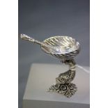 A novelty silver salt in the shape of a tazza with spoon