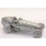 Silver coloured resin model of a Racing car