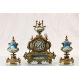 French Gilt Brass & Ceramic 19th Century clock & Garnitures with key & pendulum