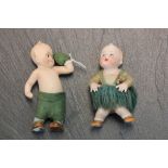 Two vintage Ceramic Kewpie Doll figures