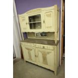 Early 20th century Painted Pine Continental Dresser, the upper section with enclosed cupboards and