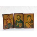 Three wooden wall plaques with Religious images