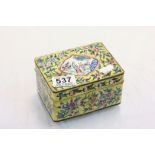 Chinese Enamel Lidded Box decorated with a panel of figures and flowers